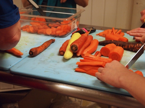 Prepping organic carrots from Klippers for pickling